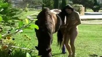Zoophile female gets orally penetrated by a horse