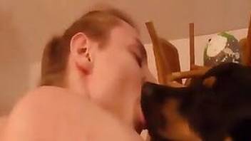 Guy kissing with a big dog and gives her his ass