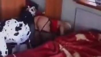 The young woman desperately craves to bang her huge canine